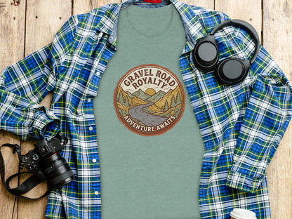 Gravel Road Royalty Vintage Adventure Tee: Backcountry Outpost Shirt: Green t-shirt with "Gravel Road Royalty Adventure Awaits" text and mountain graphic.