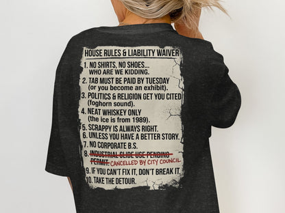 T-shirt with "House Rules & Liability Waiver" text listing ten humorous rules.