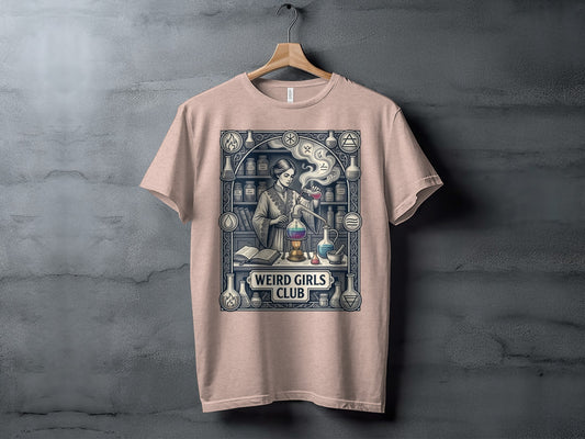 Vintage style t-shirt graphic of a woman in a laboratory with the text "WEIRD GIRLS CLUB".