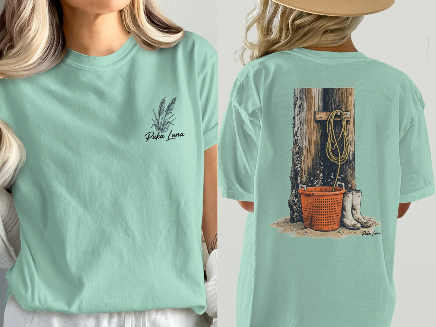 Light teal t-shirt with "Puka Luna" text and wheat graphic on front, and a rustic scene on back.