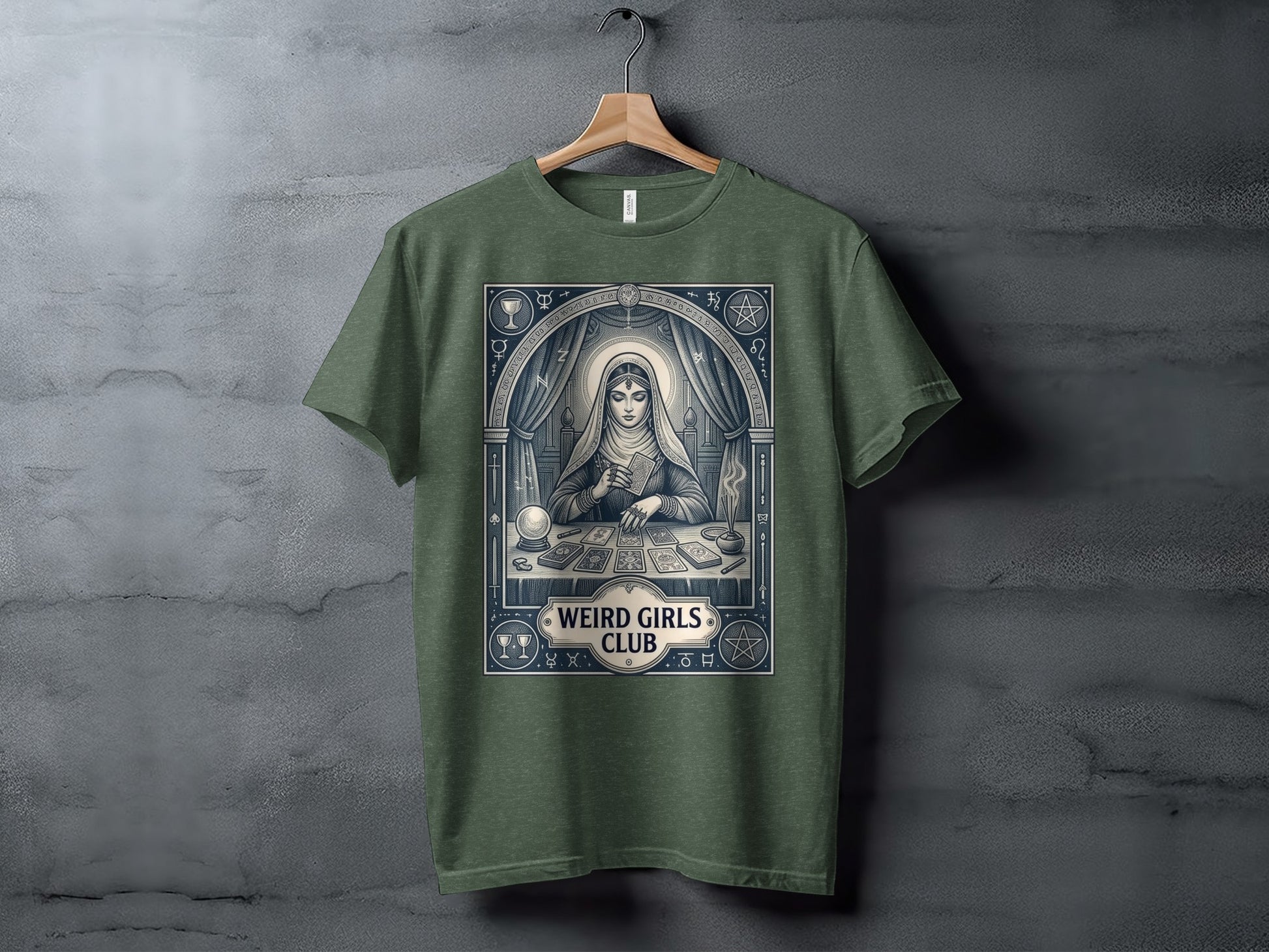 T-shirt graphic of a woman with tarot cards and celestial symbols.