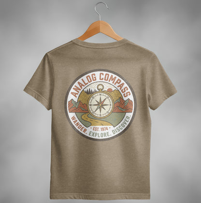 Brown t-shirt with circular "Analog Compass" logo featuring mountains, road, and compass.