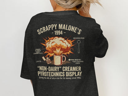 T-shirt with "Scrappy Malone's 1994 Non-Dairy Creamer Pyrotechnics Display" graphic.