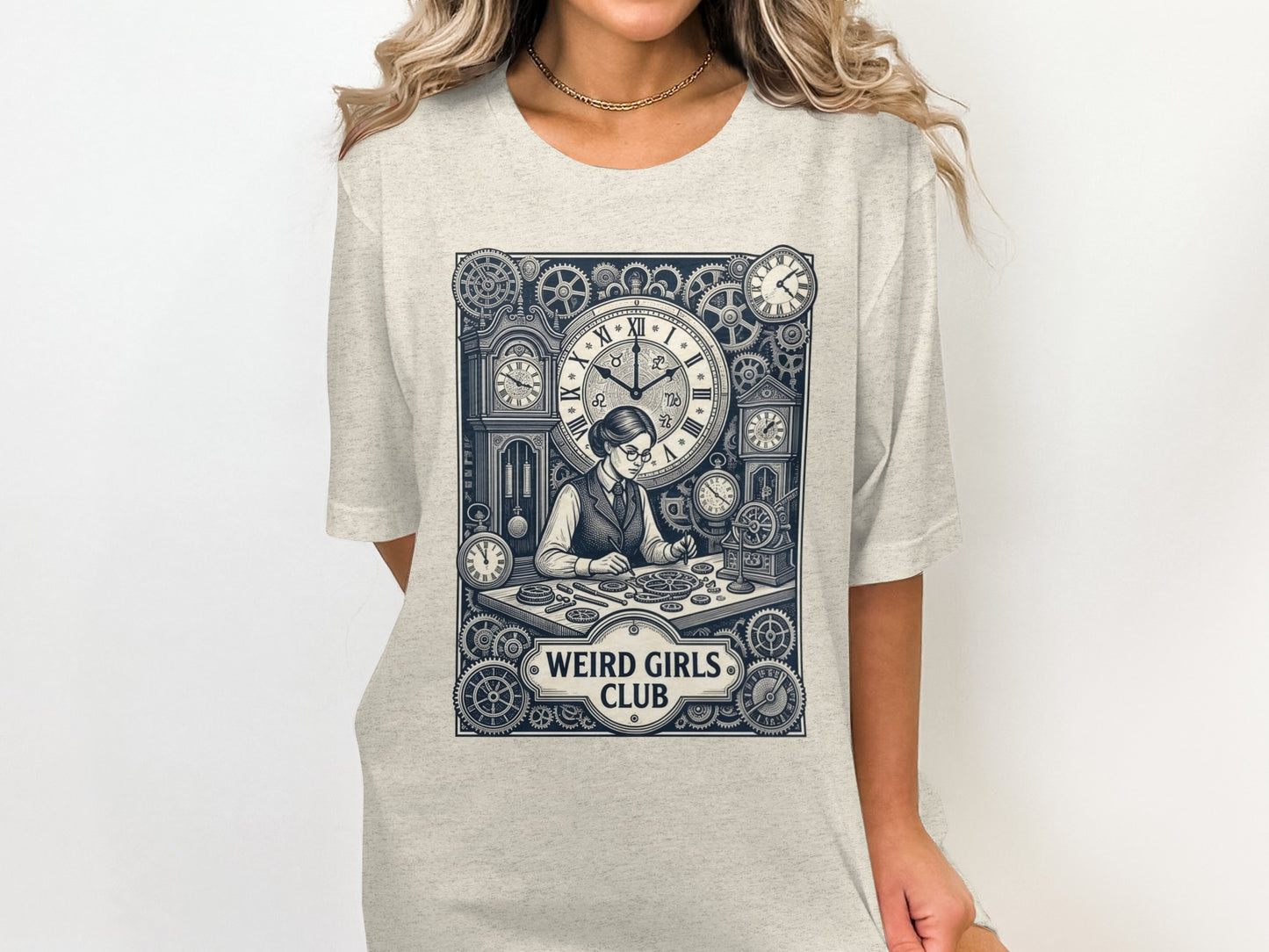 T-shirt graphic with clockwork and "WEIRD GIRLS CLUB" text.