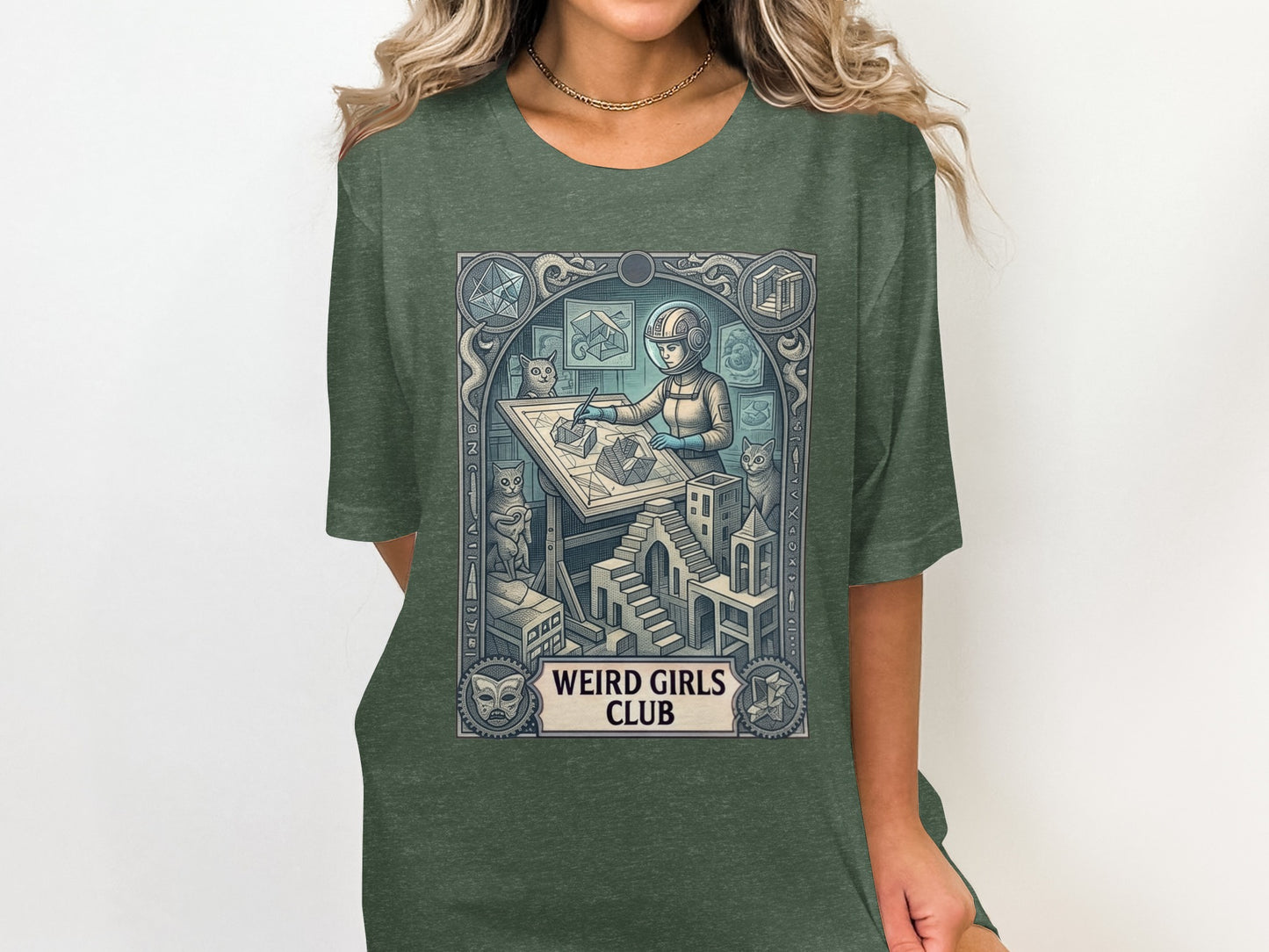 Green t-shirt with "Weird Girls Club" and geometric astronaut artwork.