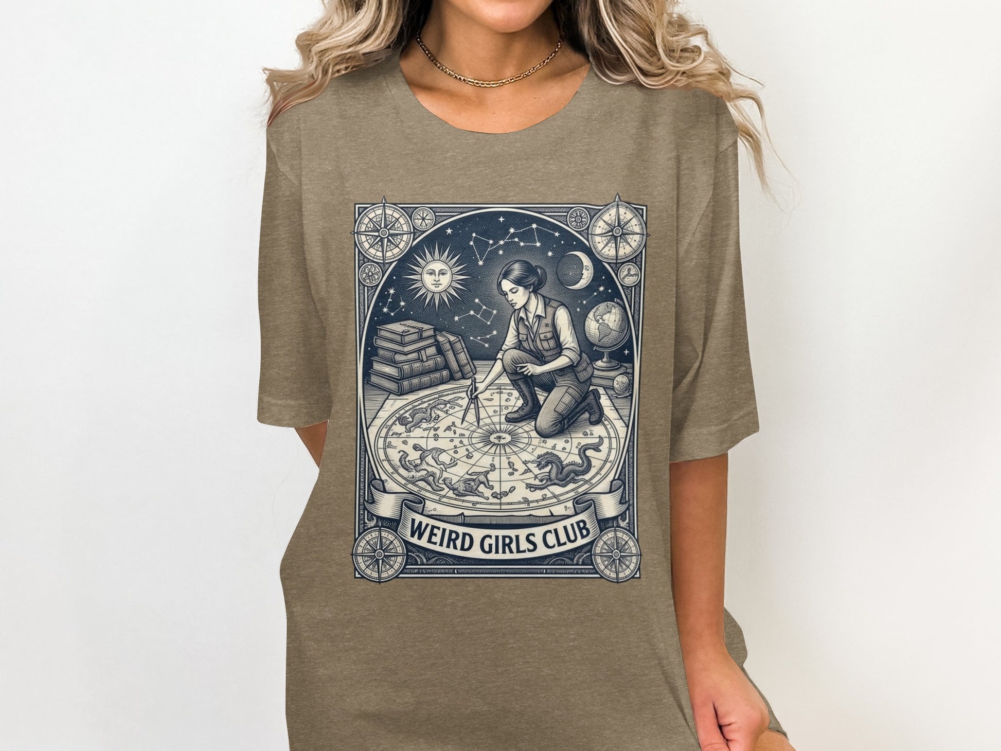 Woman kneeling with celestial map and globe, "Weird Girls Club" text.