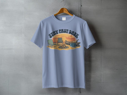 T-shirt with "Stay Past Dark" text and campfire scene with chairs.