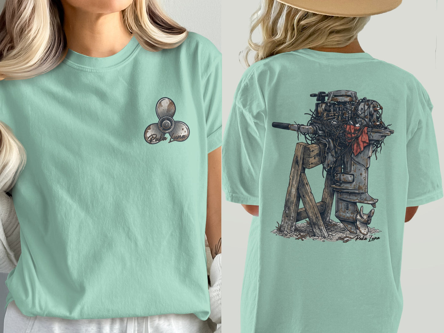 Mint green t-shirt with a propeller graphic on the left chest and a vintage outboard motor on the back.