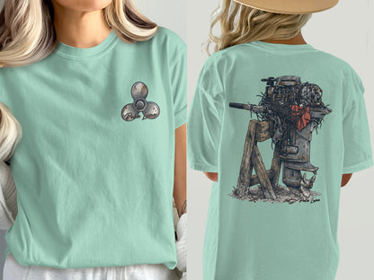 Mint green t-shirt with a propeller graphic on the left chest and a vintage outboard motor on the back.