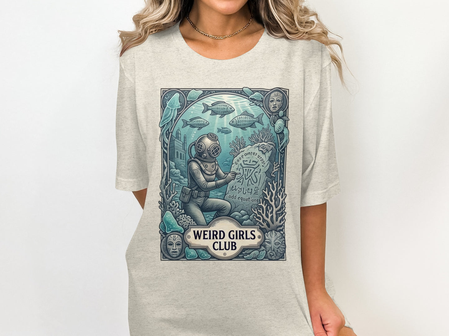 Scuba diver next to an inscribed stone with "WEIRD GIRLS CLUB" text.