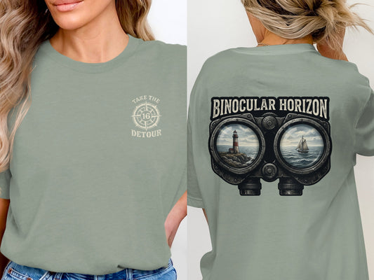 Front: compass logo with "Take the Detour". Back: binoculars viewing lighthouse and boat.