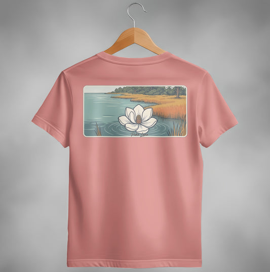 Salmon t-shirt with water lily landscape graphic on back.