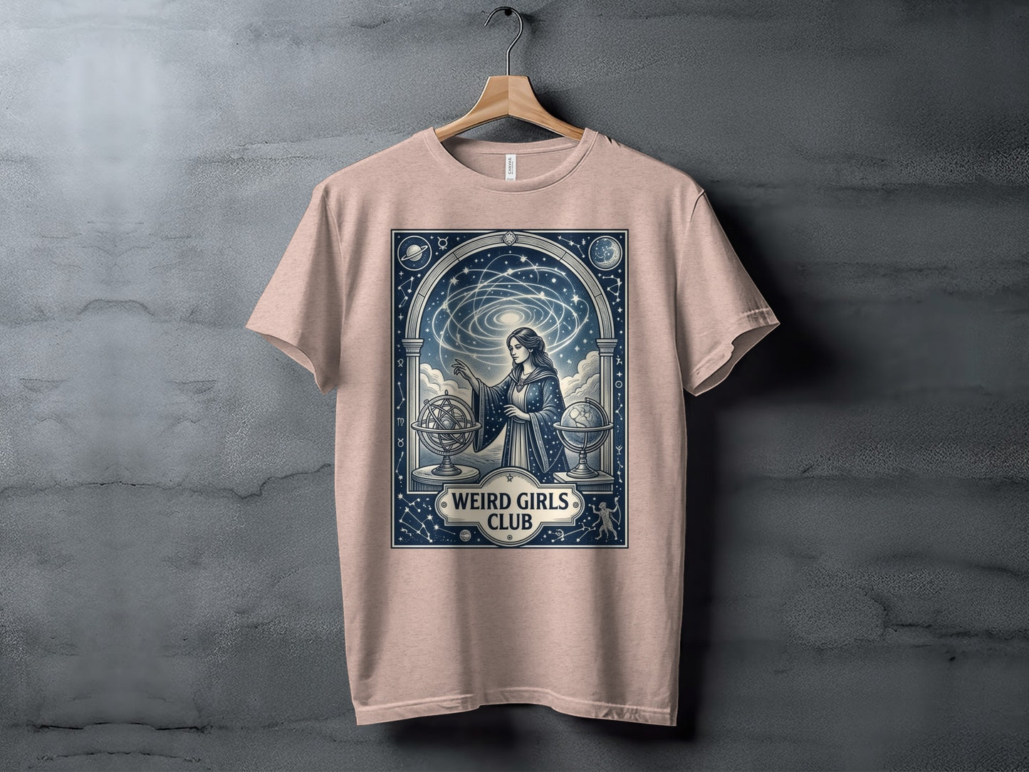 Pink t-shirt featuring a celestial scene with a woman and astronomical instruments.