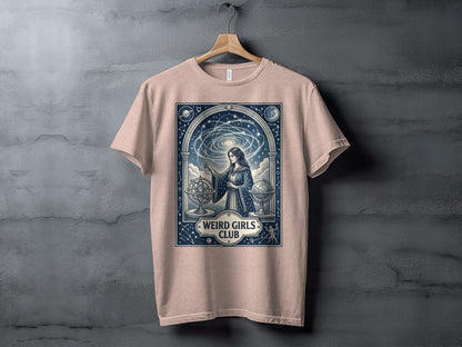 Pink t-shirt featuring a celestial scene with a woman and astronomical instruments.