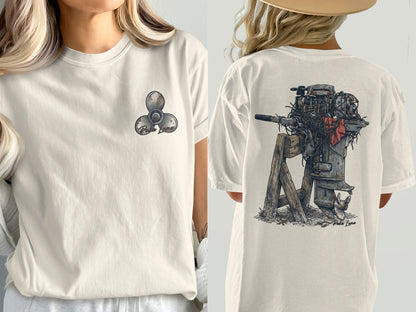 Cream t-shirt with boat propeller on front and outboard motor graphic on back.