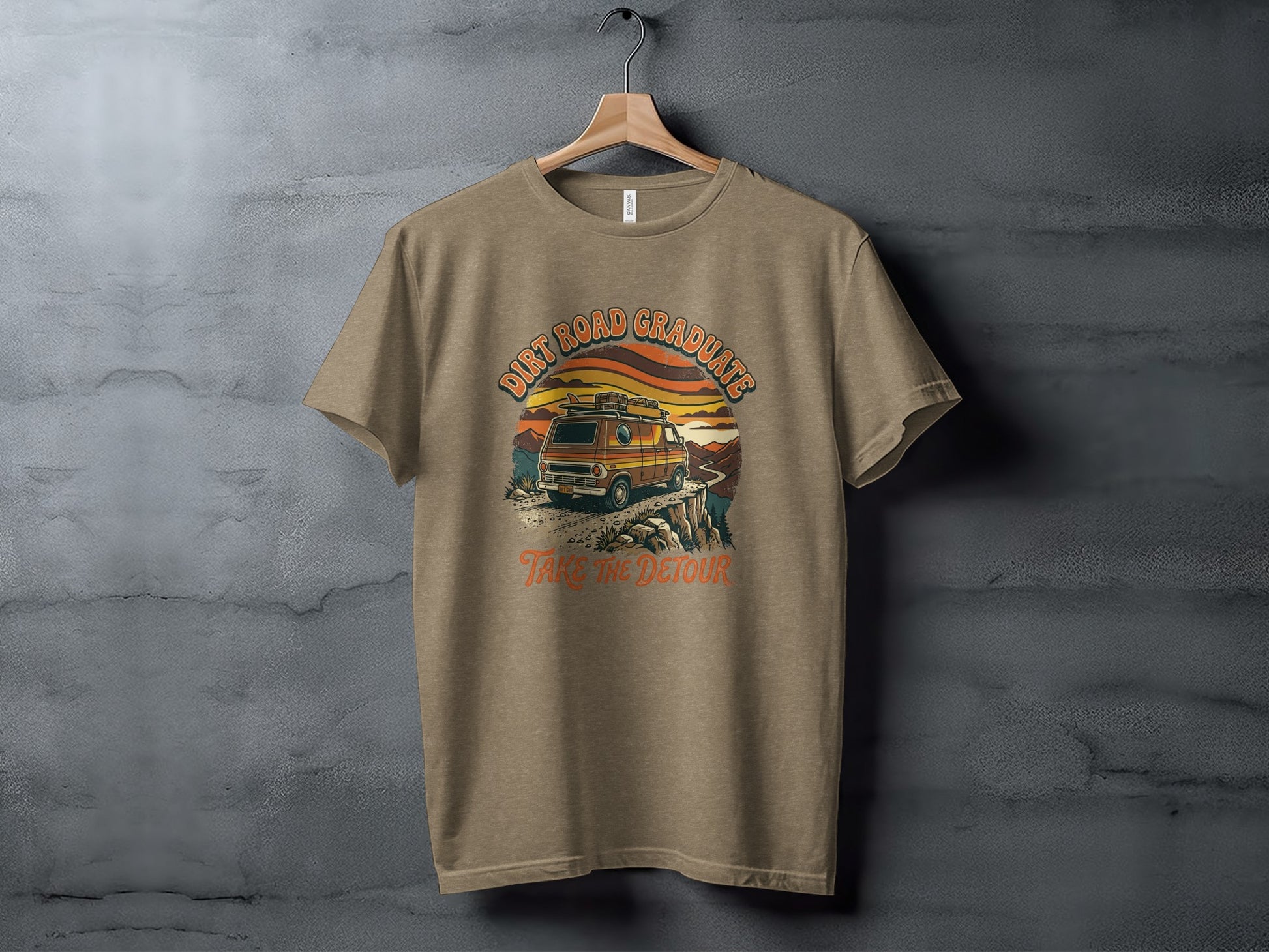 Heritage Dirt Road Graduate Adventure Tee Nomad Tee: T-shirt graphic: van on cliff overlooking sunset, "Dirt Road Graduates Take The Detour" text.