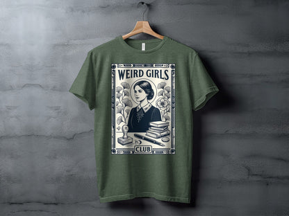 Green t-shirt with "Weird Girls Club" and illustration of a woman, books, and quill.