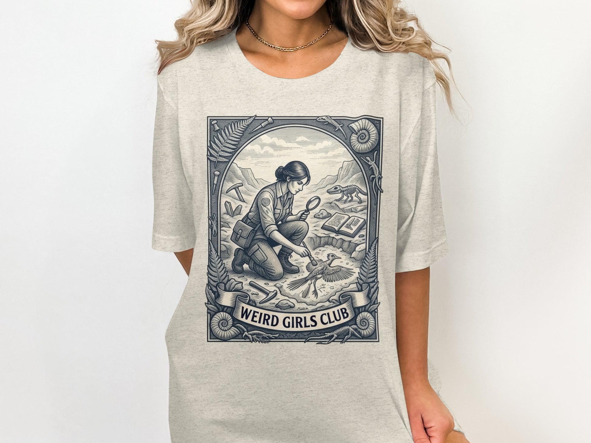 Illustration of a paleontologist examining a fossil with "Weird Girls Club" text.