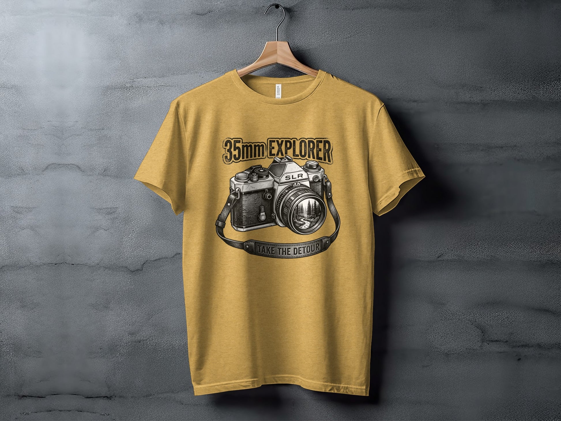 35mm Explorer Detour | Vintage Outdoor Apparel: Yellow t-shirt with vintage camera graphic and text "35mm EXPLORER TAKE THE DETOUR".
