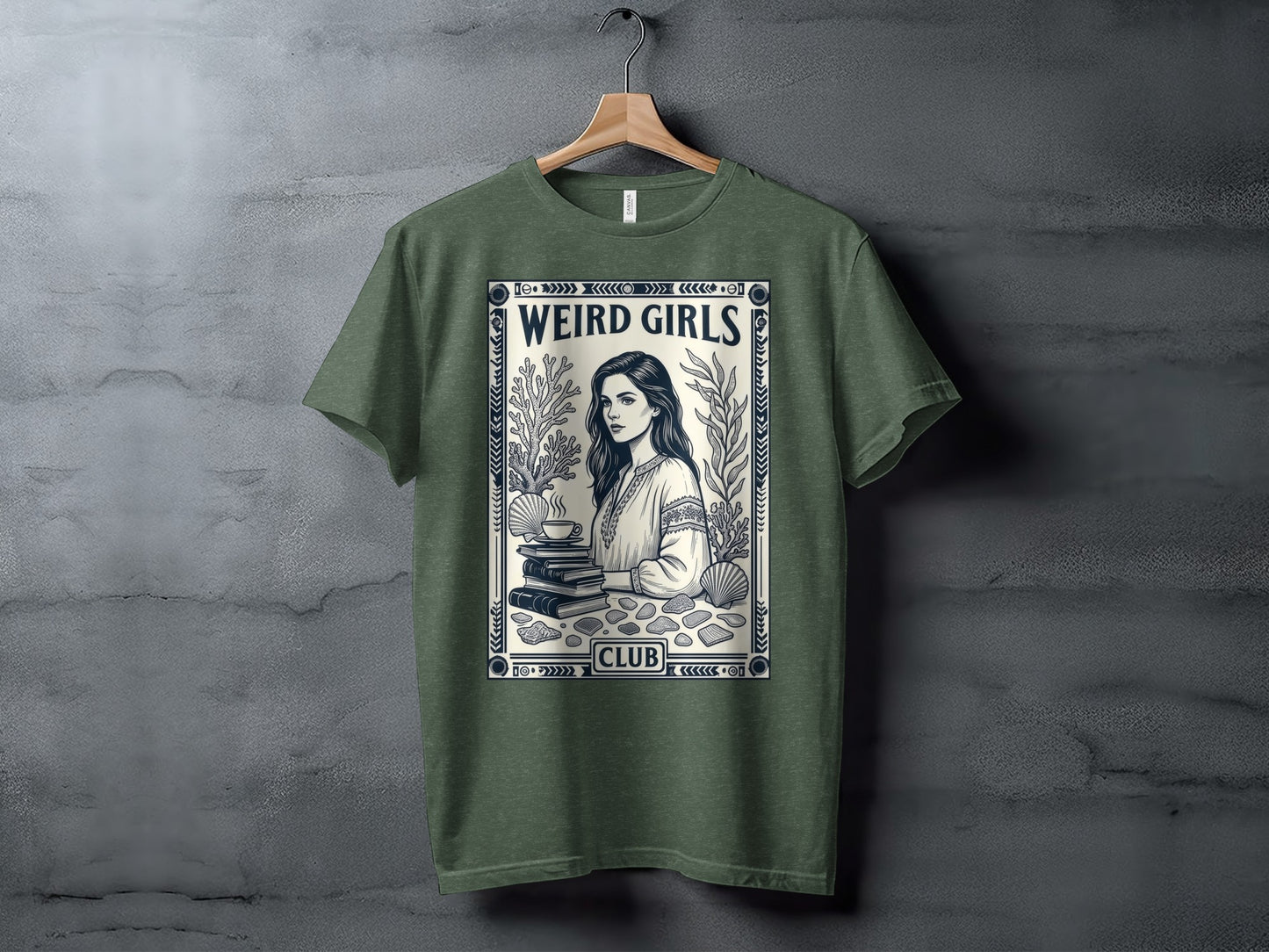 Green t-shirt with "Weird Girls Club" text and a woman reading book illustration.