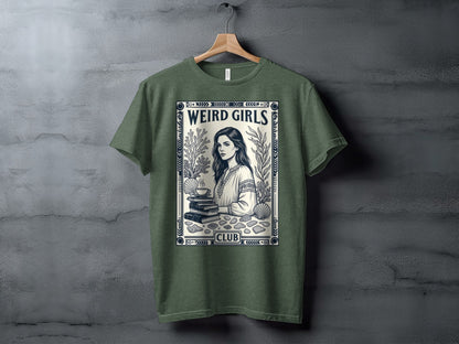 Green t-shirt with "Weird Girls Club" text and a woman reading book illustration.