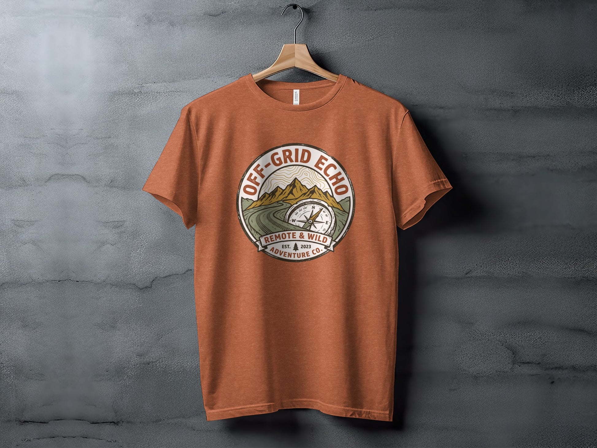Off-Grid Echo Explorer: The Explorer's Adventure Tee: Orange t-shirt with "Off-Grid Echo" circular logo featuring compass and mountains.