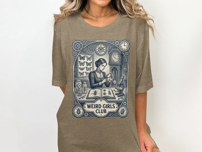 T-shirt with illustration of a woman examining insects next to clocks and butterflies.