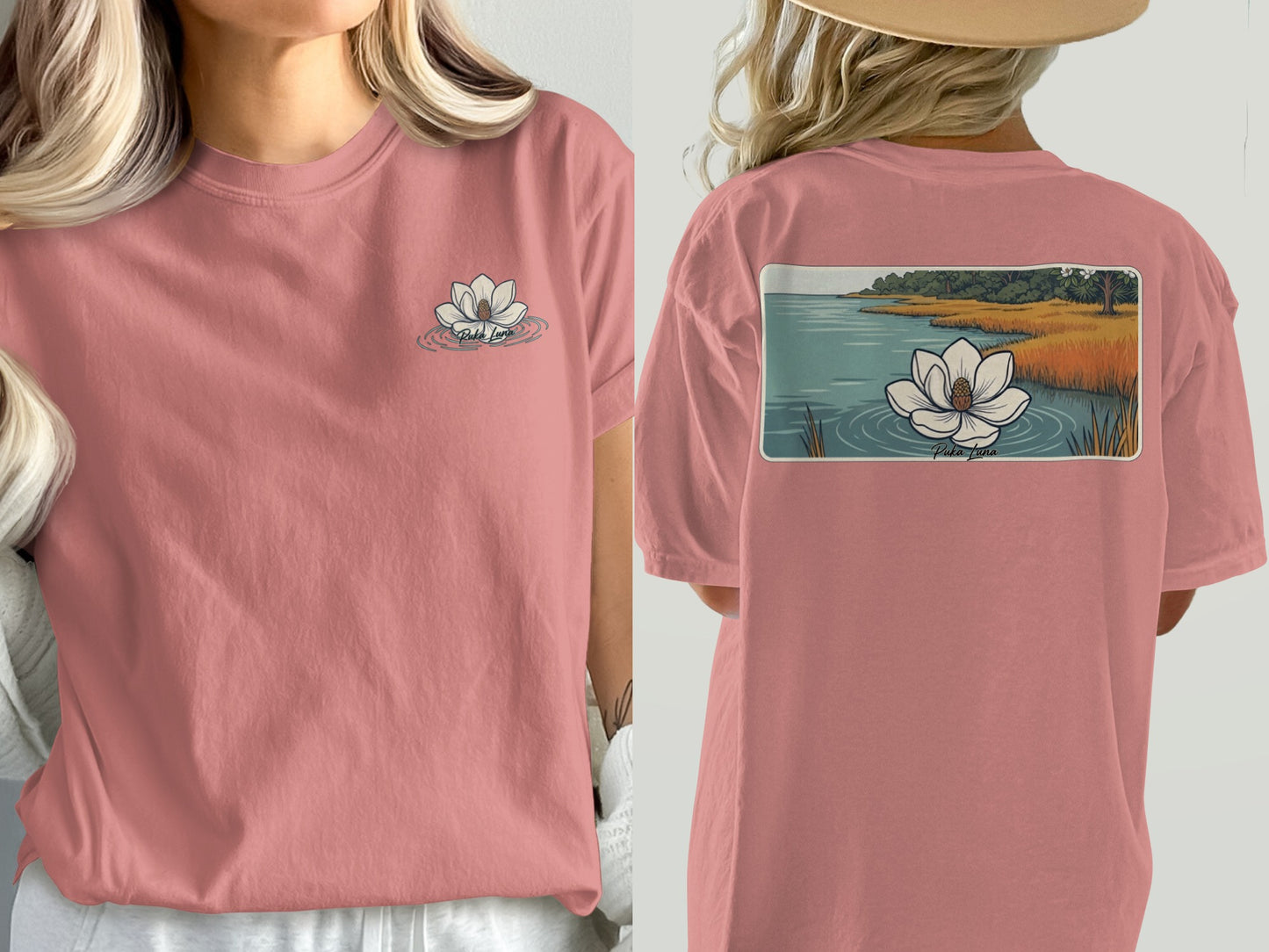 Pink t-shirt with lotus flower graphic on chest and landscape on back.