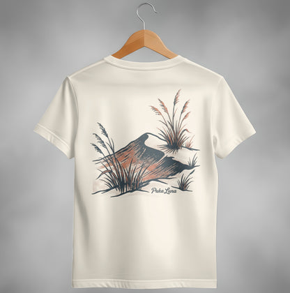 Cream t-shirt with desert landscape graphic and "Puka Luna" text.