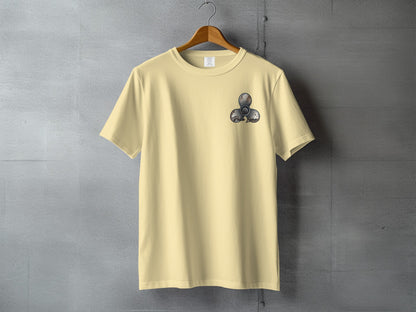 Pale yellow t-shirt with a fidget spinner graphic on the left chest.