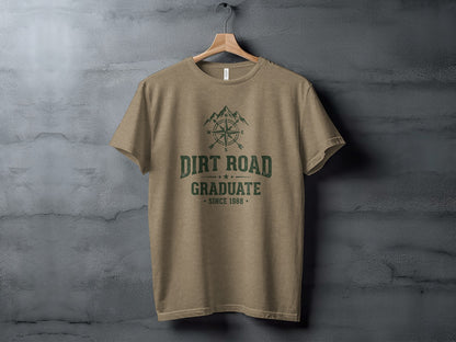 The Original Dirt Road Graduate Outdoor Adventure Top: Brown t-shirt with "Dirt Road Graduate Since 1988" and compass graphic.