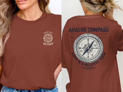 Brown t-shirt with "Take the 16 Detour" on front and "Analog Compass Lost is a Relative Term" on back.