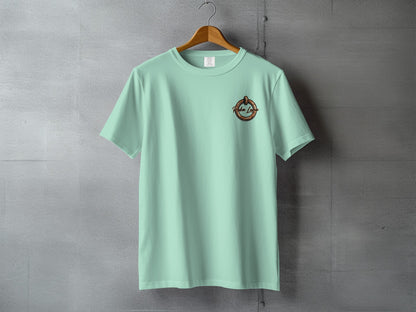 Light mint green t-shirt with "Rockstar Logo" text and circular emblem on left chest.