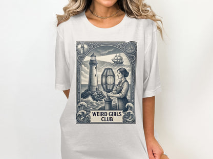 T-shirt with vintage lighthouse, woman, and sailing ship graphic.