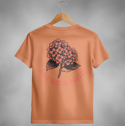 Peach t-shirt with floral hydrangea design and text "SONG WATER HOODS".