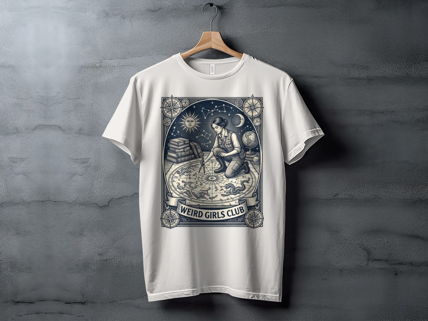 White t-shirt with "Weird Girls Club" emblem featuring a woman and celestial motifs.