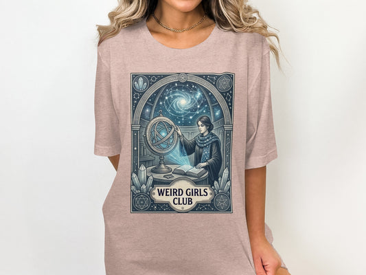 T-shirt featuring an illustration of a person with a globe and celestial charts.