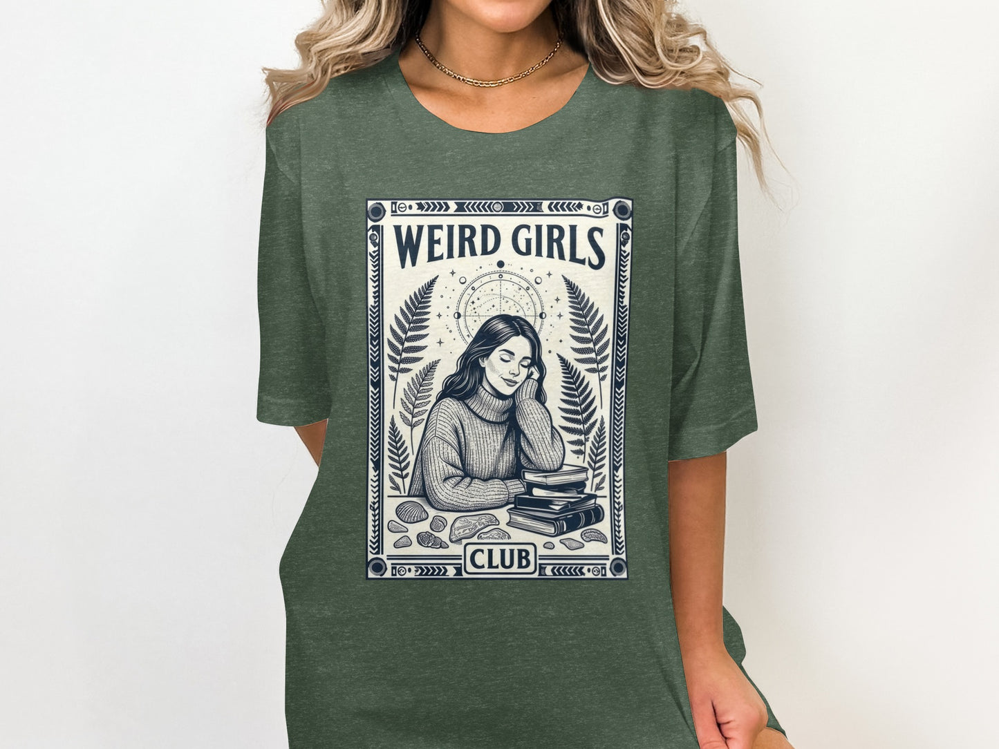 Green t-shirt with "WEIRD GIRLS CLUB" graphic of woman reading books.