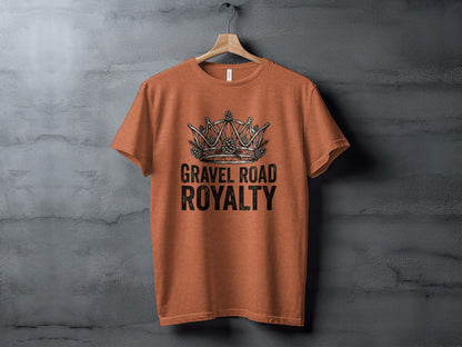 Gravel Road Royalty: Backcountry Outpost Shirt: Orange t-shirt with crown, pinecones, and text "GRAVEL ROAD ROYALTY".