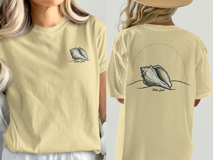 Light yellow t-shirt with a shell graphic and "Puka Luna" text on front and back.