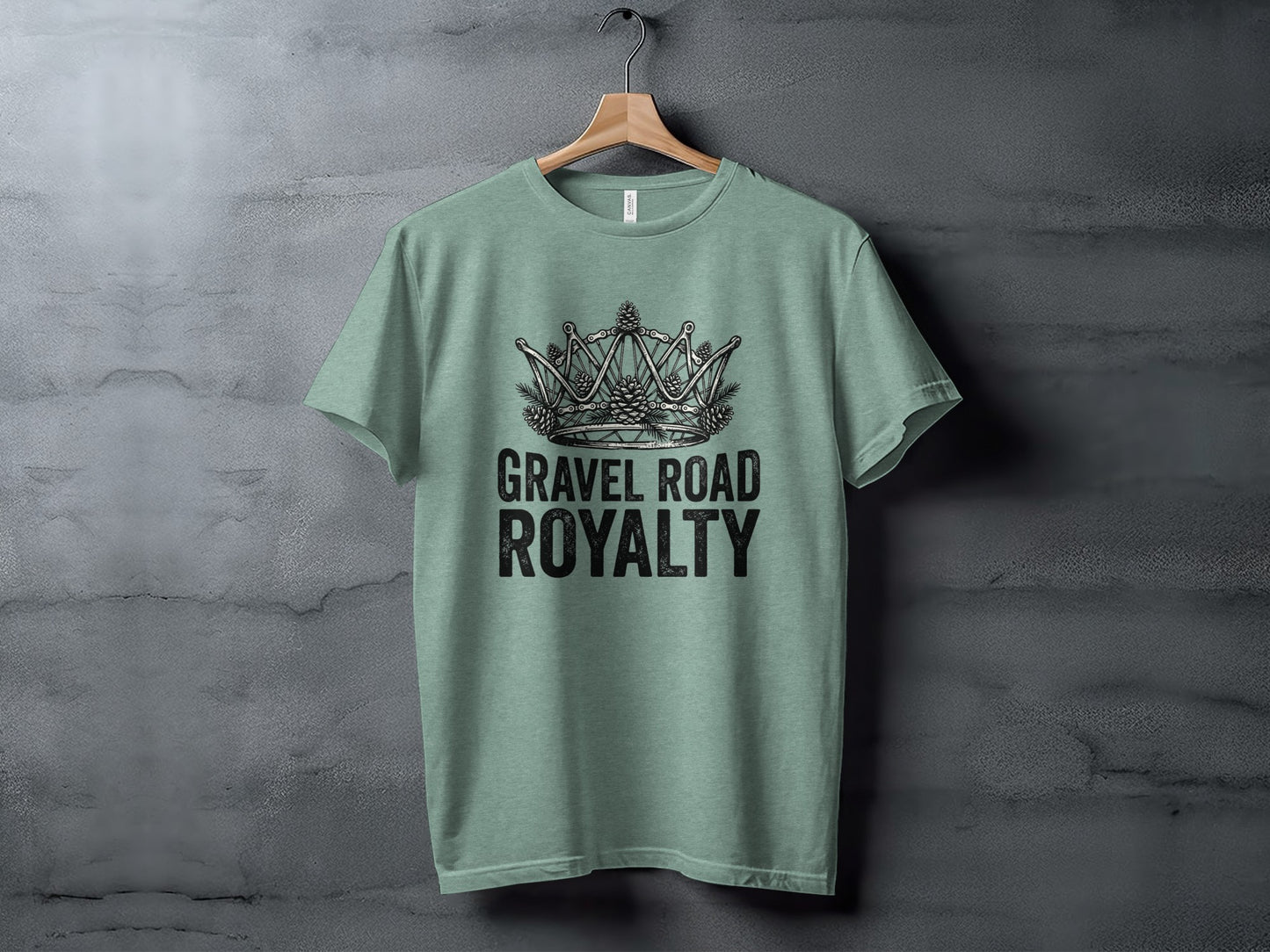 Gravel Road Royalty: Backcountry Outpost Shirt: Sage green t-shirt with "GRAVEL ROAD ROYALTY" and crown graphic.