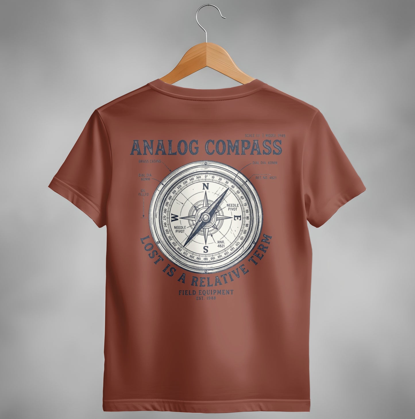 Brown t-shirt with vintage analog compass design and "Lost is a relative term" text.
