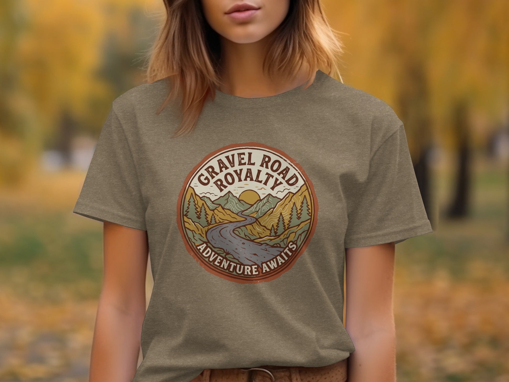 Gravel Road Royalty Vintage Adventure Tee: Backcountry Outpost Shirt: Gravel Road Royalty Adventure Awaits graphic on a brown t-shirt.