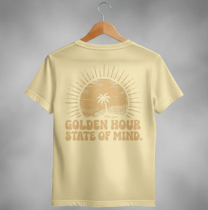Cream t-shirt with "Golden Hour State of Mind" and a sun and palm tree graphic.