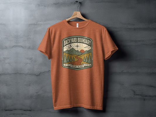 Rugged Backyard Boundary: Explore The Wild Wilderness Shirt: Rustic landscape graphic tee with "Backyard Boundary Explore the Wild" text.