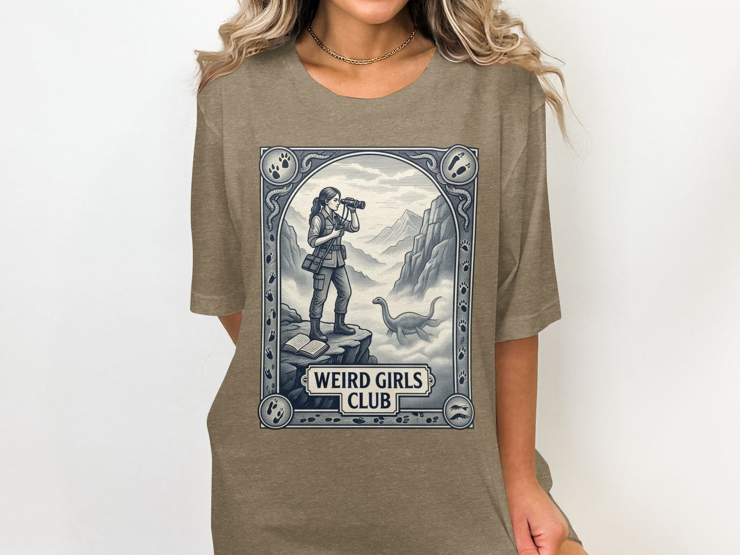 Woman wearing t-shirt with vintage illustration of explorer and dinosaur.