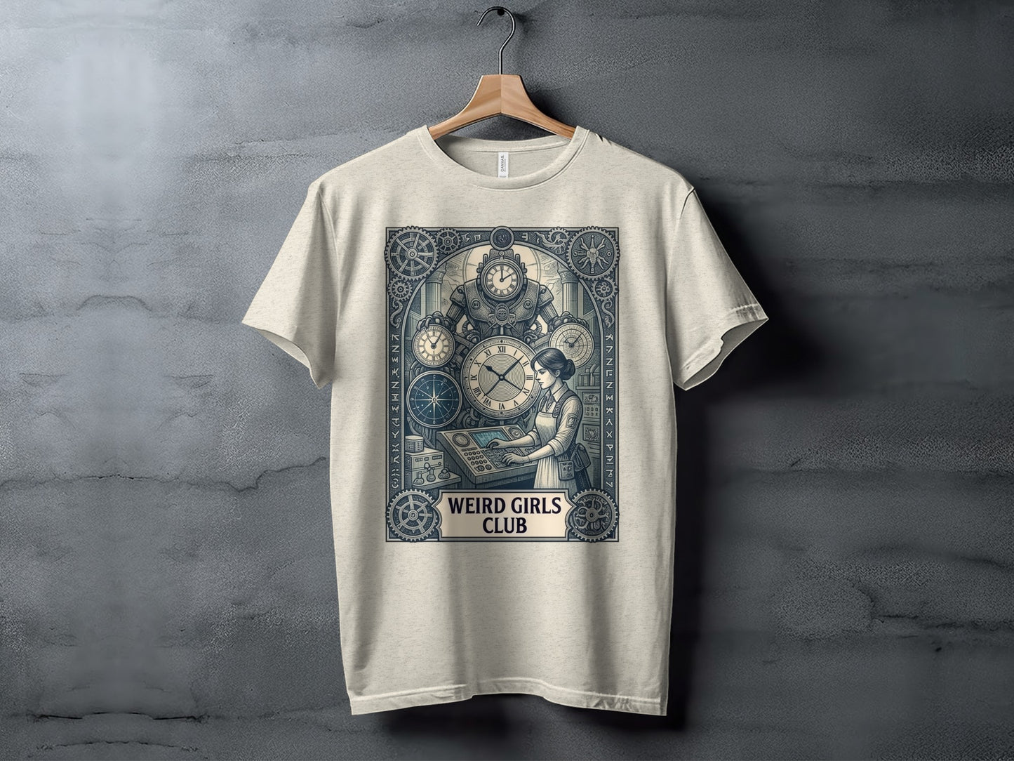 Cream t-shirt with "Weird Girls Club" steampunk-inspired clockwork design.