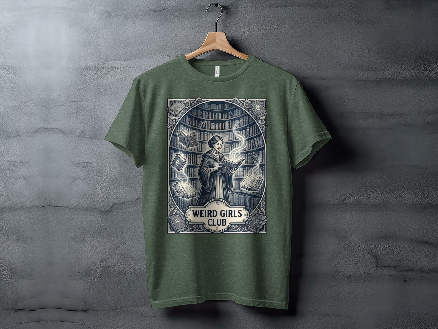 Green t-shirt with "Weird Girls Club" text and a woman reading surrounded by books.