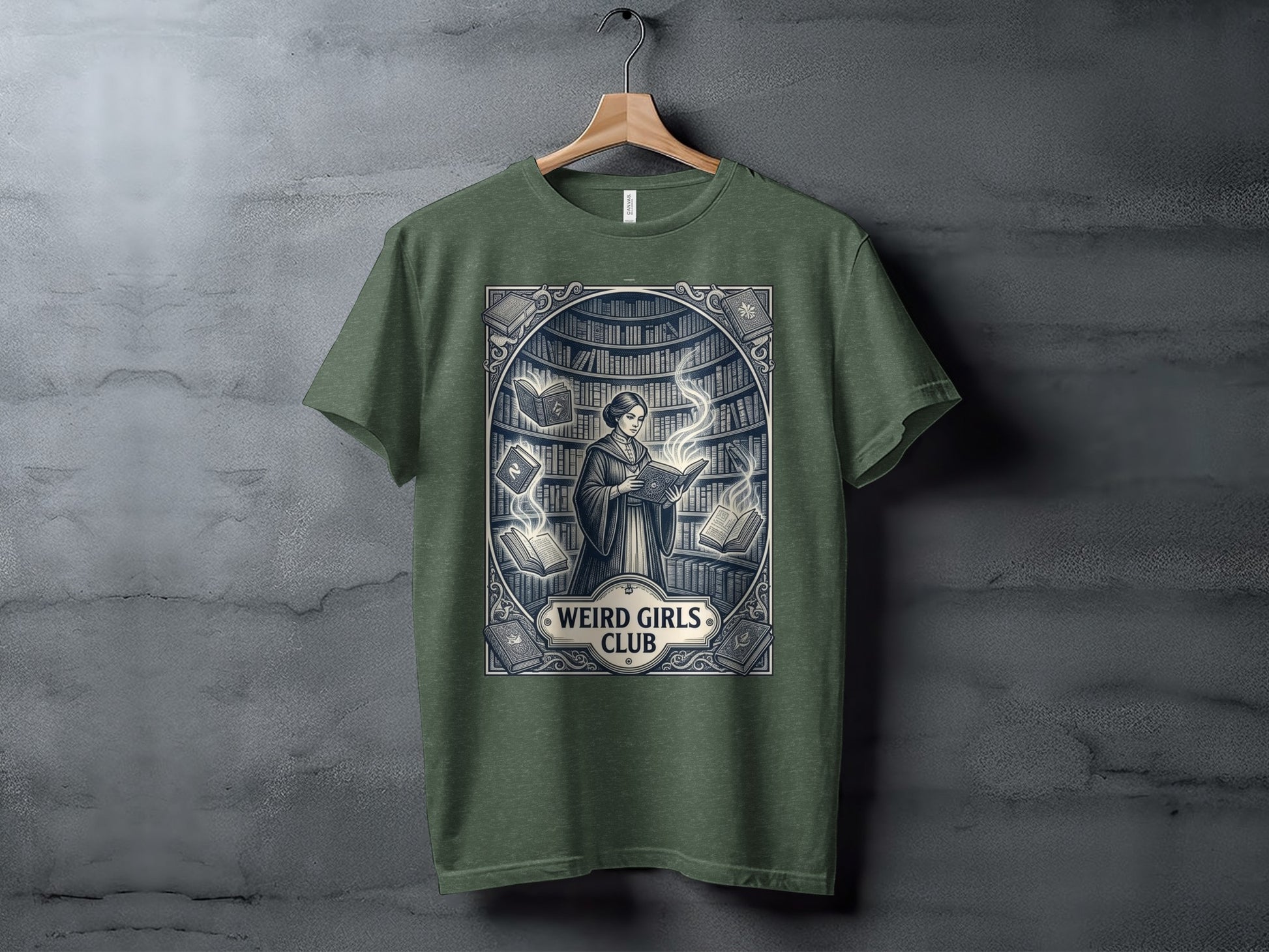 Green t-shirt with "Weird Girls Club" text and a woman reading surrounded by books.