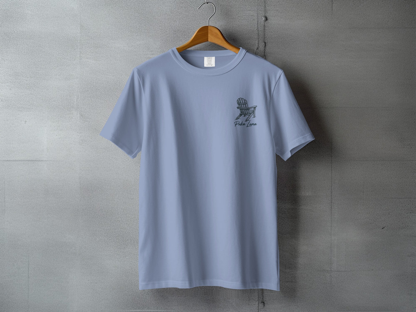 Light blue t-shirt with a small graphic of a chair and text "Palm Luna" on the left chest.
